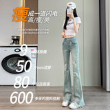 High-Rise Hole Micro-Tight Jeans Women Spring Autumn 2025 New Thin Haired Side Dragging Broad Leg Horn Pants