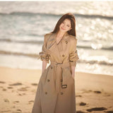 High-End Kiqi Wind Coat Woman 2026 New Autumn And Winter In The Long-Term Small British Style Korean Popular
