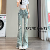 High-Rise Hole Micro-Tight Jeans Women Spring Autumn 2025 New Thin Haired Side Dragging Broad Leg Horn Pants