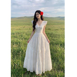 Xinjiang Yunnan Tourism Seaside Holiday Yellow Long V Collar Small Flying Sleeves To Close The Waist Dress French Retro Dress